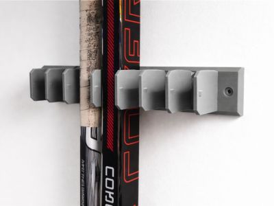 Veggfeste til hockeykølle